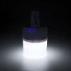 Portable Solar LED Emergency Lamp emitting bright light in a dark setting, perfect for outdoor activities and emergencies.