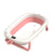 Cute Portable Small Foldable Baby Bath Tub in pink and white color, designed for small spaces and easy storage.