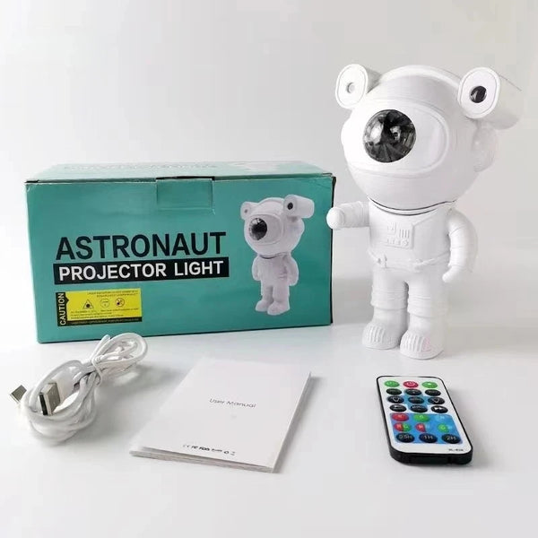 Star Projector Galaxy Night Light with astronaut design, remote control, and instruction manual for cosmic ambiance.