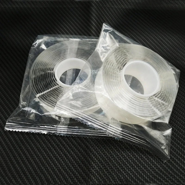 Double-Sided Nano Gel Grip Tape in transparent packaging, ideal for easy securement of objects without residue.