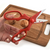 Heavy-Duty Stainless Steel Kitchen Poultry Shears in hand, with walnut and cutting board background.