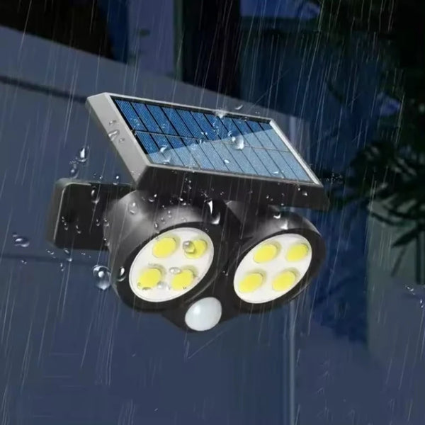 Outdoor Solar LED Garden Lamp with solar panel, waterproof in the rain, ideal for outdoor lighting.