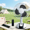 Rechargeable Cooler Battery Portable Fan on a table outdoors with a remote control, ideal for versatile cooling.