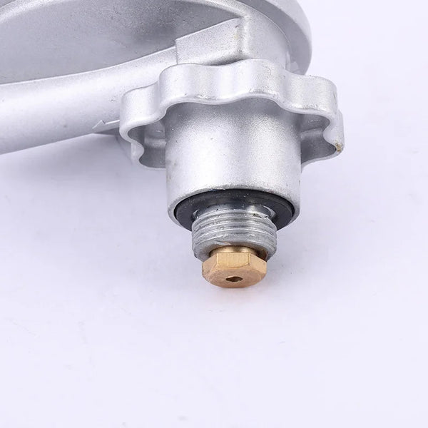 Close-up of 28mbar LPG Gas Regulator with Shutoff Valve showing connection detail and securing mechanism.