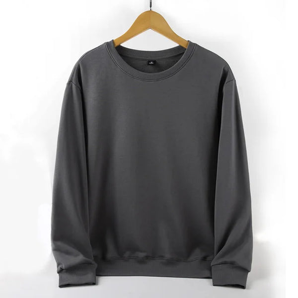 Unisex Oversized Blank Hoodies in grey hanging on a wooden hanger.