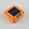 Portable LED Solar Power Flood Light solar panel in orange design for efficient outdoor lighting.