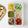 6-Compartment Fresh-Store Organizer with pasta, green vegetables, nuts, and cherry tomatoes for easy meal prep.