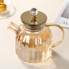 Elegant Large Capacity All-Glass Tea Set featuring a transparent teapot with a gold lid and crystal handle.