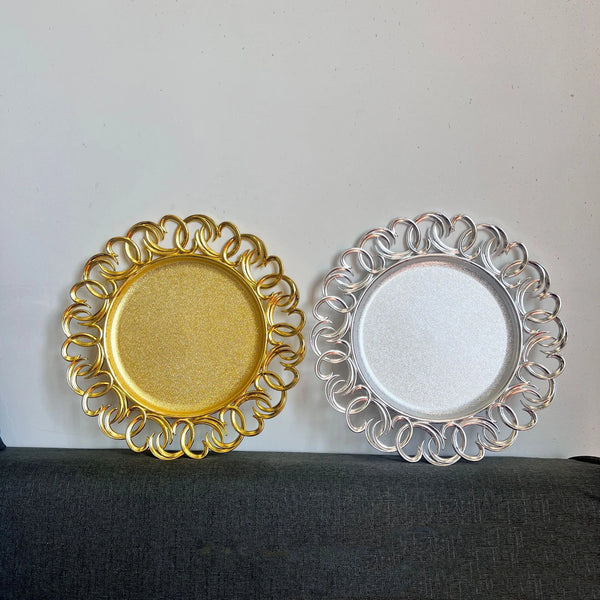 13 Inch Gold Wooden Textured Round Plastic Charger Plate paired with a silver charger plate on a grey background.