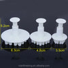 Snowflake Plunger Cookie Cutter Set featuring three sizes with plunger mechanism for easy cake and cookie decorating.
