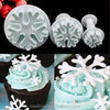 Snowflake Plunger Cookie Cutter Set including three cookie cutters for detailed baking decorations.