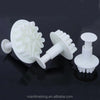 Snowflake Plunger Cookie Cutter Set displayed with three white plunger cookie cutters for easy baking decorations.