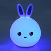 Colour-Changing Rabbit USB Night Light glowing softly in blue, designed for a calming and comforting atmosphere.