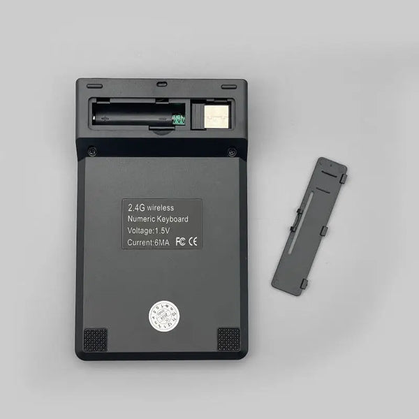 2.4G Wireless USB Receiver Remote Control Device with battery compartment and numeric keyboard.