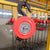 European Hook Manual Chain Hoist with a 2-ton lifting capacity in a warehouse setting.