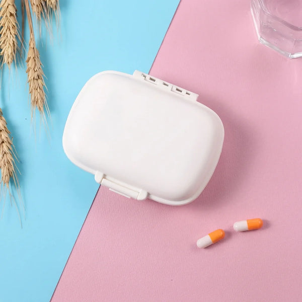 Weekly Pill Organizer Case for efficient medication management with pills on a colorful background.