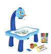 LED Projector Art Drawing Board for Kids showing a blue drawing table with projector and art supplies.