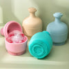 Reusable Silicone Ice Face Roller with Facial Brush in pink, beige, light blue, and teal colors with ice inside.