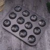 Carbon Steel Shell Shape Baking Mold for making twelve shell-shaped treats.
