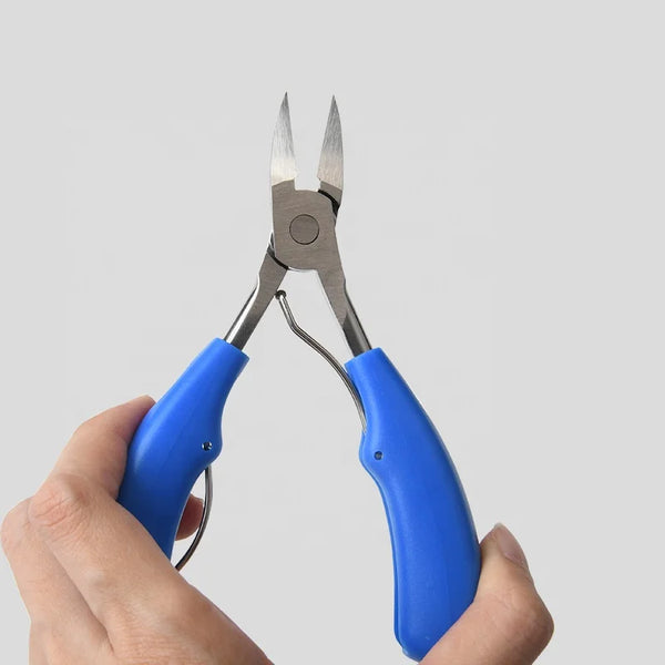 Professional Nail Cutter Nipper for Thick Nails held in hand with blue ergonomic handles.