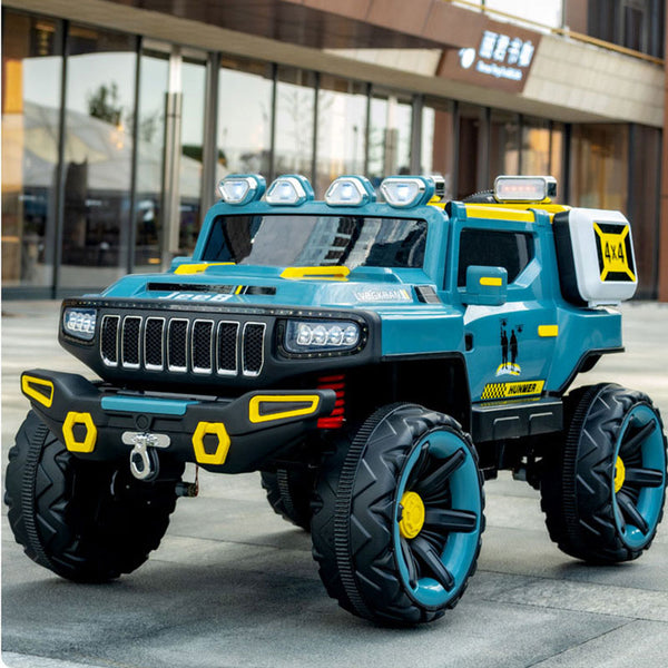 Four Wheel Offroad Remote Control Toy Car with large wheels and bright colors on a city street.