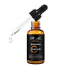 Vitamin C Brightening Face Serum in a dropper bottle with a drop falling, designed to brighten skin and tackle dark spots.