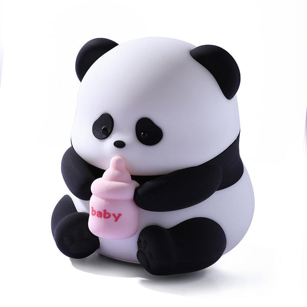 The Sitting Panda USB Night Light with a pink baby bottle, ideal for decoration and soft lighting.