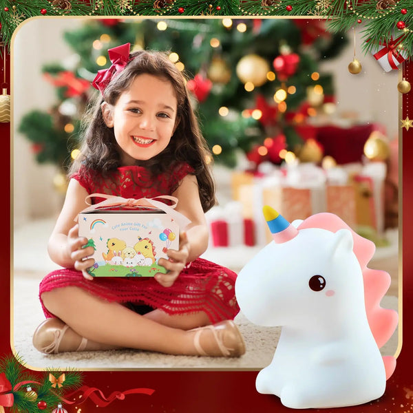 Happy girl in red dress with Kids Gifts LED Touch Sensor Baby Night Light unicorn design and gift box in festive setting.