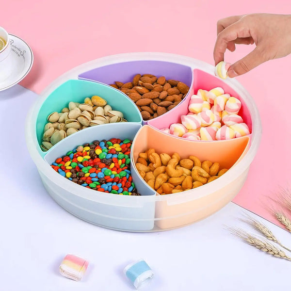 Creative Round Divided Fruit & Snack Serving Tray filled with colorful snacks and nuts in a multi-compartment design.
