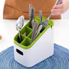 Modern Multifunctional Kitchen Countertop Storage Rack holding cutlery and utensils in the kitchen.