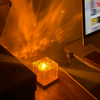 USB Ocean Wave Dynamic Water Ripple Pattern Lamp casting flowing light effects on a wall, creating a calming atmosphere.