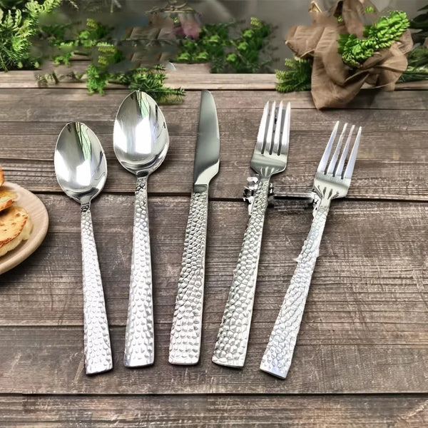 5-Piece Silverware Set Stainless Steel Flatware with stylish textured handles on wooden table.