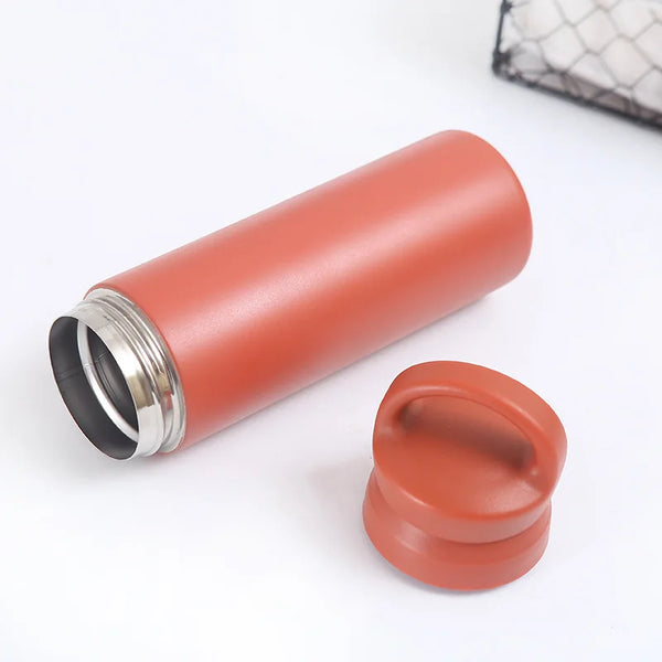 Stainless Steel Wide Mouth Sport Thermos in orange color with detachable cap on a white background.