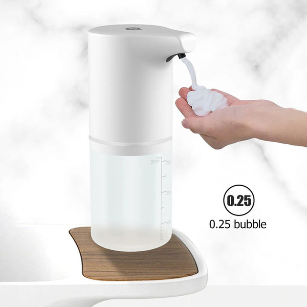 Automatic Soap Dispenser dispensing soap while hands receive a foam bubble on a countertop.