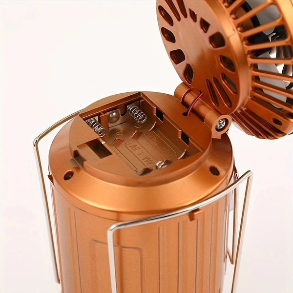 Solar LED Camping Lamp with Fan showing internal battery compartment and fan mechanism.