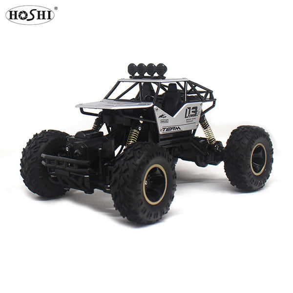 High Quality 4WD Alloy Climbing Off-Road Truck with rugged design and large tires for outdoor play.