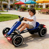 A boy enjoying the Electric Off-Road Go Kart Van in a sunny park setting.