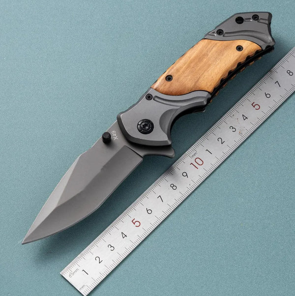 3D Pattern Blade Olive Wood Handle Pocket Knife with measuring ruler for size comparison.