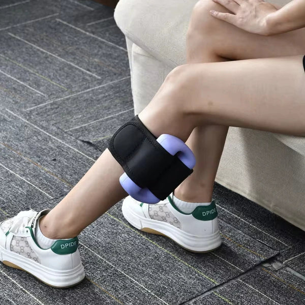 User demonstrating the Mini Portable Deep Tissue Fascial Massager Gun on their leg for muscle relief.