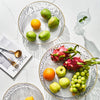 Fruit Plate Snack Serving Tray with assorted fresh fruits and elegant glassware on a marble table.