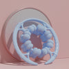 32 Wheel Ring Muscle Relaxation Leg Massager in light blue with textured wheels for muscle tension relief.