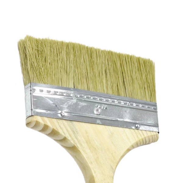 Close-up of an Industrial 6-Inch Wall Painting Brush showing the bristles and wooden handle.
