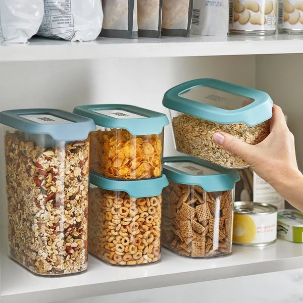 Dry Food Storage Container with Lid arranged on a shelf, showcasing organized pantry essentials like cereals and snacks.