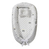 Cotton Adjustable Baby Lounger Nest Cover with crown patterns and soft cushioning for baby's comfort and security.