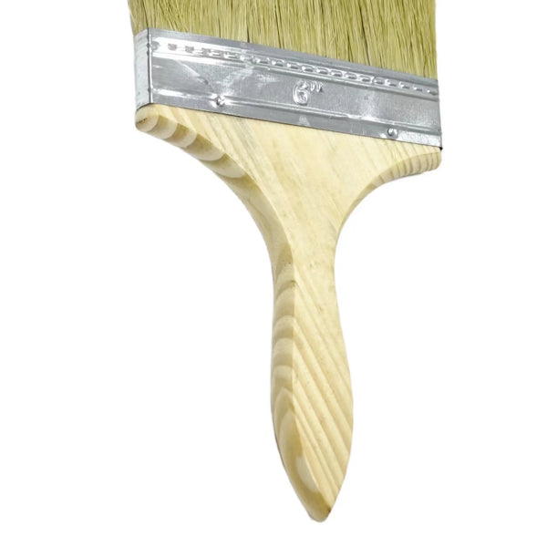 Close-up of an Industrial 6-Inch Wall Painting Brush with a wooden handle and wide bristles.