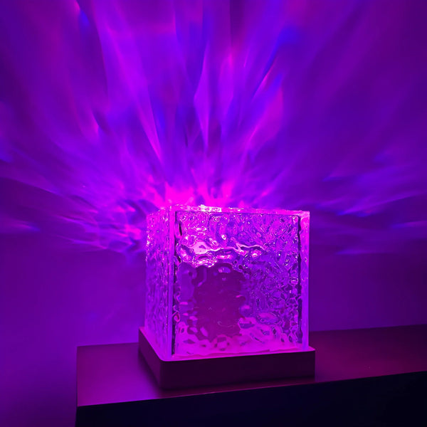 USB Ocean Wave Dynamic Water Ripple Pattern Lamp projecting soothing purple water ripple effects onto the wall.