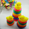 Rainbow Duck Stacking Tower Toy with colorful rings and yellow duck figures, promoting sensory development for children.