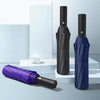3-Fold Minimalist Automatic Umbrella in black and purple displayed on a minimalist background.