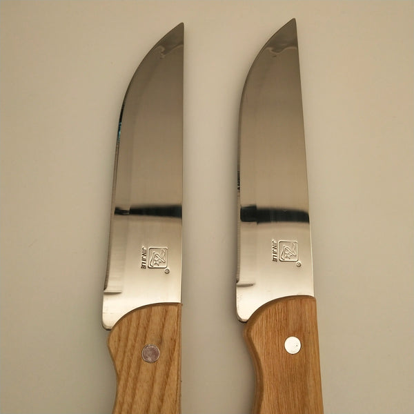 Stainless Steel Japanese Style Fruit Knife, showcasing curved blades and wooden handles for effective food preparation.
