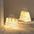 Crystal Bag USB Night Lamp glowing softly on a bedside table, enhancing room decor with warm ambient light.